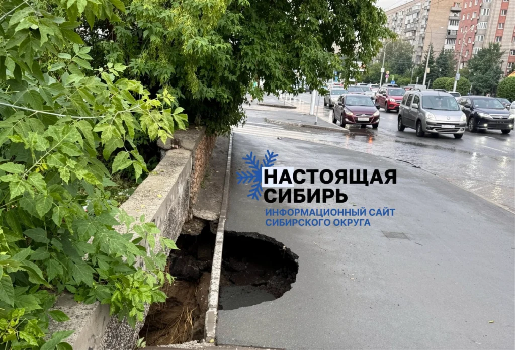На Красном проспекте в Новосибирске больше недели остаётся неогороженной глубокая яма в асфальте